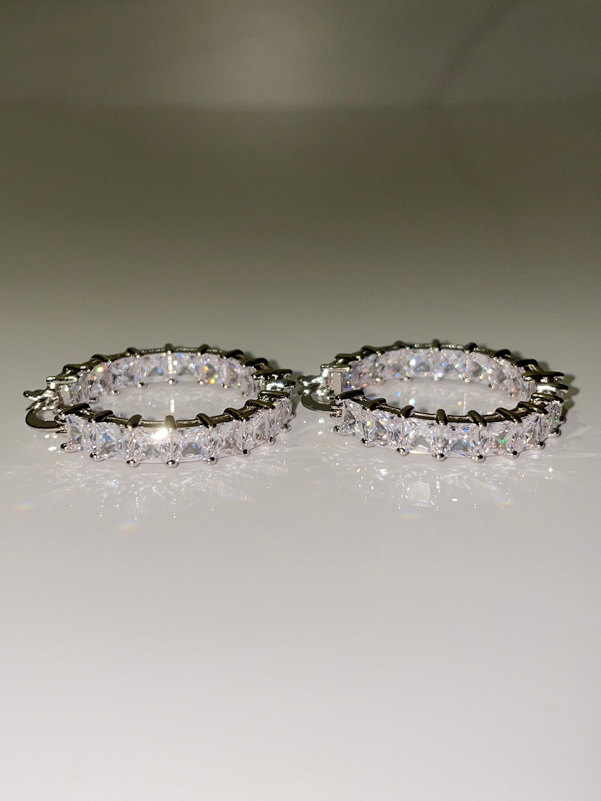 cubic zirconia inside out mini hoop earrings