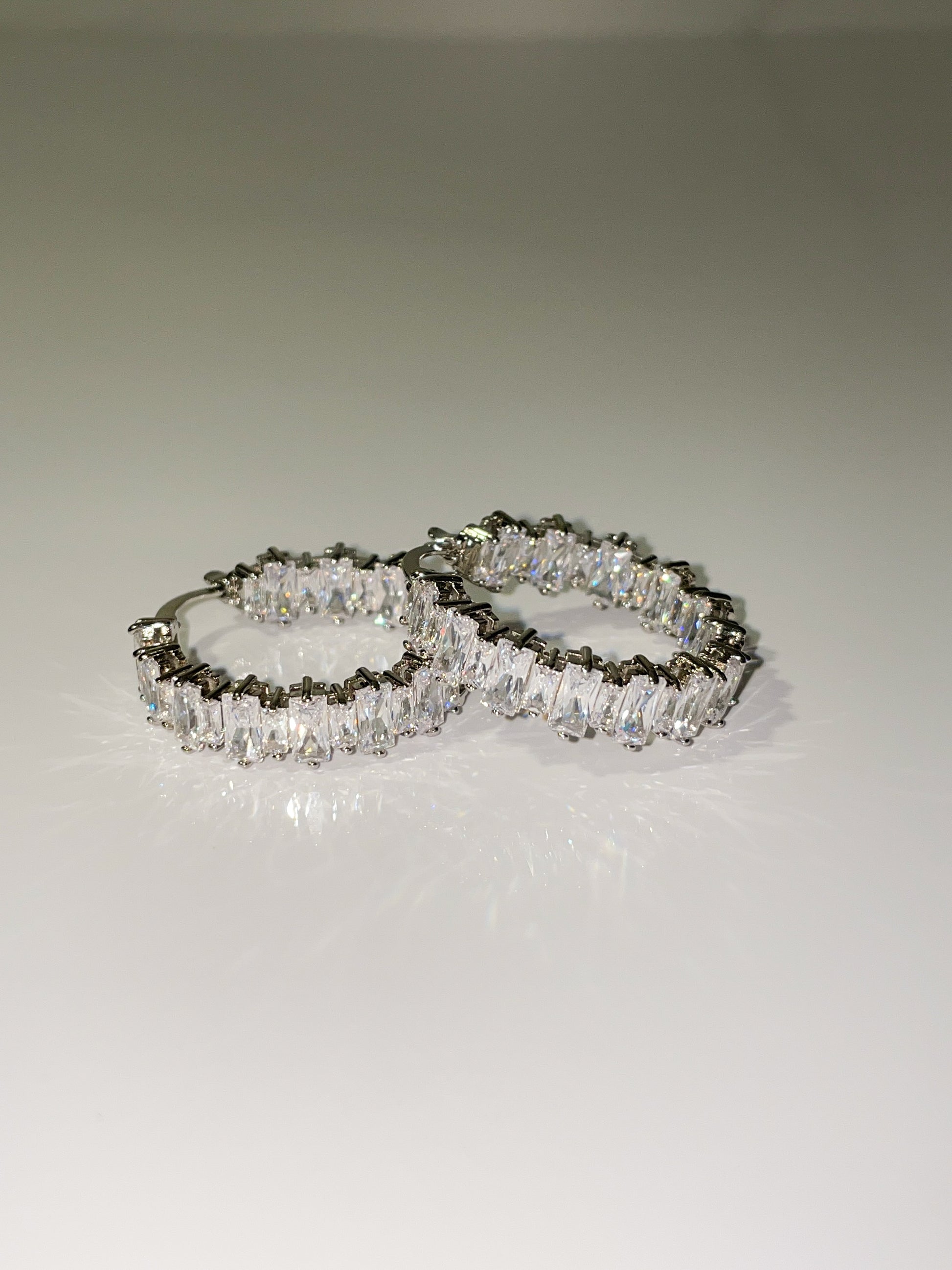 silver cubic zirconia baguette inside out mini hoop earrings