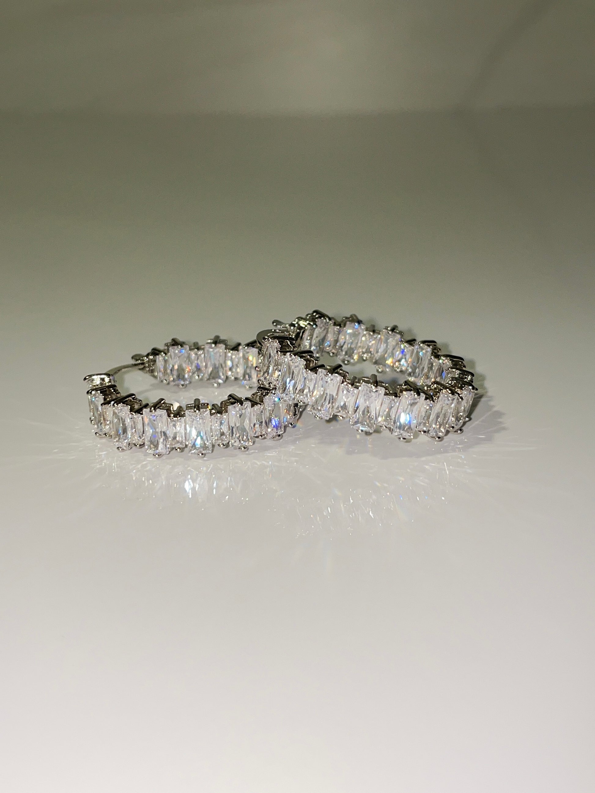 silver cubic zirconia baguette inside out mini hoop earrings