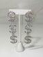 silver rhinestone dangle dollar sign earrings
