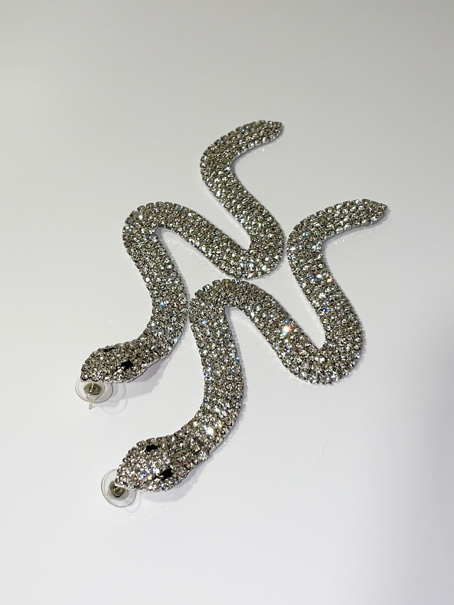 silver rhinestone bling snake earrings 
