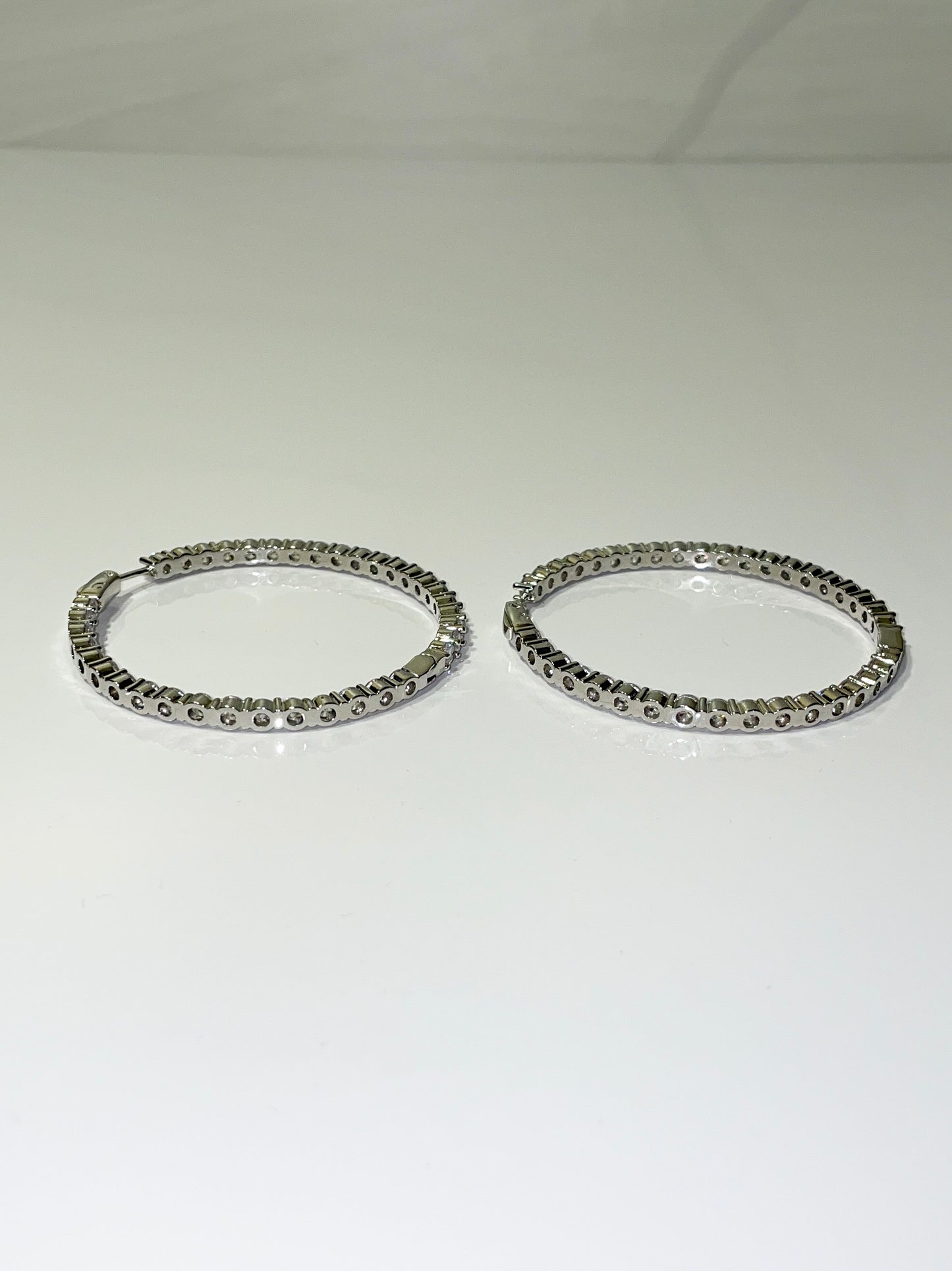 silver bling cubic zirconia cz inside out hoop earrings
